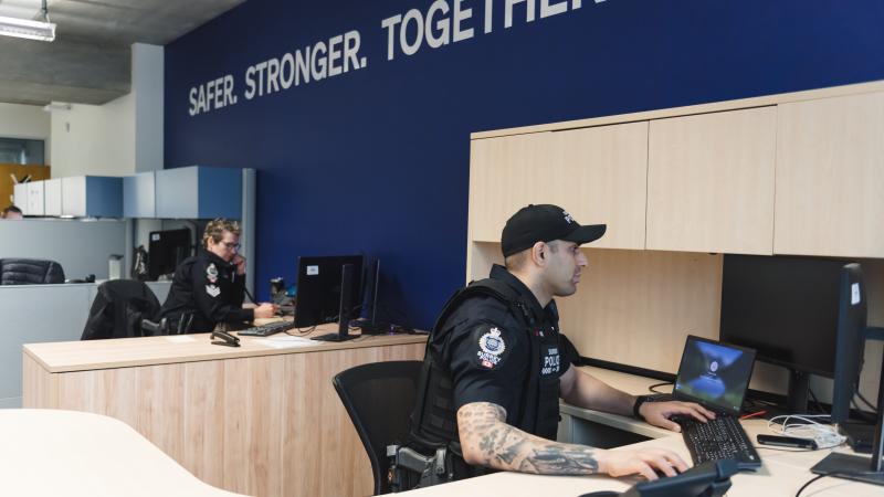 Officers on computers